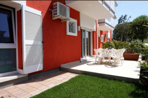 Modern apartment with private garden Porto Santa Margherita